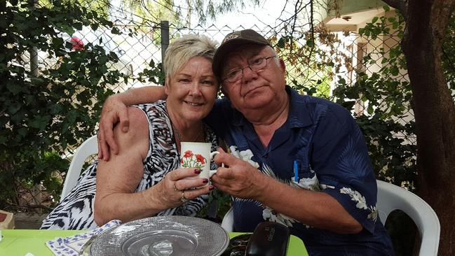 Heartfelt gift ... Guven Pinar with Cameron Baird's mother Kaye and the mug used by Cameron and presented to his parents when they visited Gallipoli in 2015. Picture: Courtesy of the Baird family