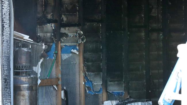 The aftermath of a fire that destroyed a home at Wooloowin on Sunday morning. Picture: Liam Kidston.