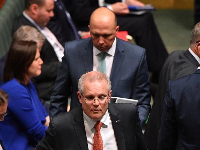 Prime Minister Scott Morrison and Minister for Home Affairs Peter Dutton leave after Question Time in the House of Representatives at Parliament House in Canberra, Thursday, September 13, 2018. (AAP Image/Mick Tsikas) NO ARCHIVING