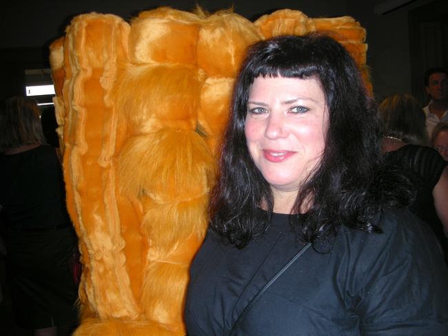 Kathy Temin with another of her works, Orange Cube, 2015, made from synthetic fur, synthetic filling, wood, and steel. Picture: Robin Amadio.