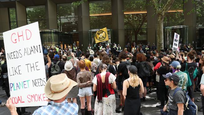 Protesters march to the Rio Tinto offices in Collins St. Picture: AAP