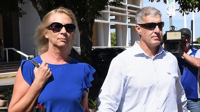 Former NT Police Assistant Commissioner Peter Bravos with wife Cindy Bravos outside the Supreme Court after pleading not guilty to two counts of rape. Picture: Katrina Bridgeford