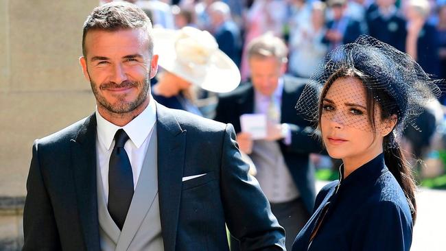 Former England footballer David Beckham (L) and fashion designer Victoria Beckham (R) arrive for the wedding ceremony of Prince Harry and  Meghan Markle. Picture: AFP Photo