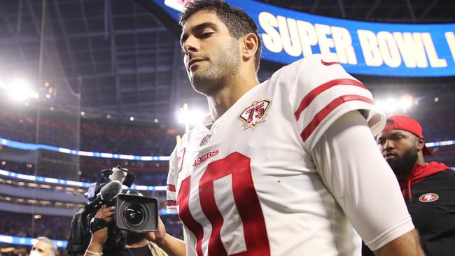 INGLEWOOD, CALIFORNIA - JANUARY 30: Jimmy Garoppolo #10 of the San Francisco 49ers walks off the field after being defeated by the Los Angeles Rams in the NFC Championship Game at SoFi Stadium on January 30, 2022 in Inglewood, California. The Rams defeated the 49ers 20-17.   Christian Petersen/Getty Images/AFP == FOR NEWSPAPERS, INTERNET, TELCOS & TELEVISION USE ONLY ==