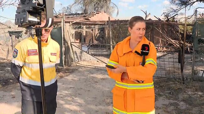 7NewsPerth reporter Letitia Wallace being closely watched by a DFES WA representative.