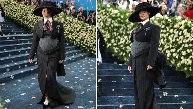 Yet again, Rhianna revealed her third pregnancy in a very public way, wearing a pinstripe Marc Jacobs suit dress that showed off her baby bump. Met Gala. Picture: Getty