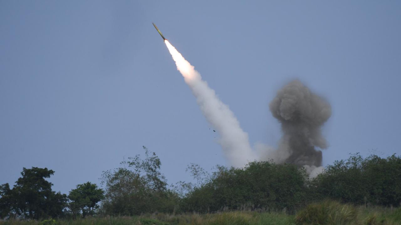 The US military fires a high mobility artillery rocket system (HIMARS) during a live fire exercise on April 26, 2023. (Photo by TED ALJIBE / AFP)