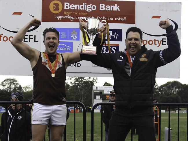 Boronia captain Lachlan McKernan and coach Matt Clark show off the silverware. Picture: Davis Harrigan