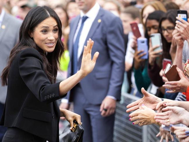 Meghan pictured wearing a Givenchy suit. Picture: Mega