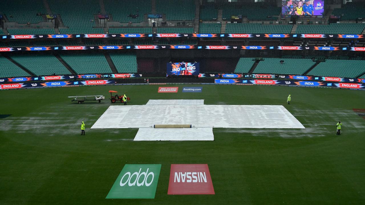 Sydney has received more than 20mm of rain since 9am. Photo: Saeed Khan/AFP.