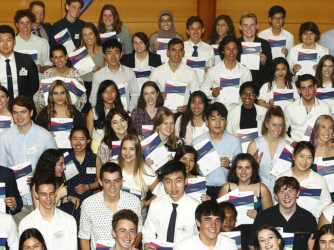 HSC Course First Place achievers pose for a group photo with Premier Gladys Berejiklian, Education Minister Sarah Mitchell and Education Department Leaders. HSC First in Course Presentation. Picture: John Appleyard