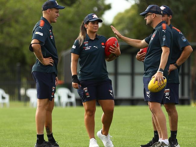 Jason Williams (left) with other Cannons coaches.