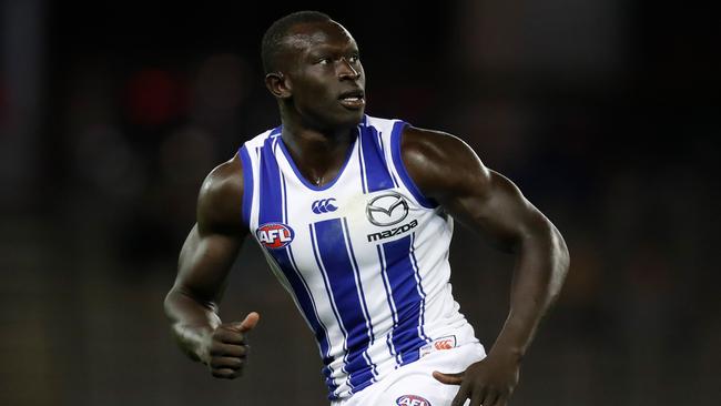 MELBOURNE, AUSTRALIA - FEBRUARY 21: Majak Daw of the Kangaroos in action during the 2020 Marsh Community Series match between the Western Bulldogs and the North Melbourne Kangaroos at Marvel Stadium on February 21, 2020 in Melbourne, Australia. (Photo by Michael Willson/AFL Photos via Getty Images)