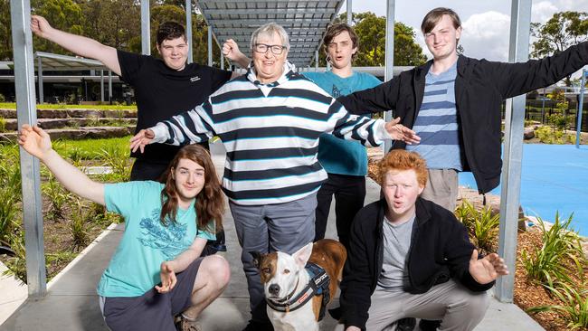 MELBOURNE, NOVEMBER 29, 2022: Croydon Community School is the second most improved school in the state. L to R students Jared, Aaron, David, Judd and Andrew with principal Bronwyn Harcourt and dog Amos. Picture: Mark Stewart