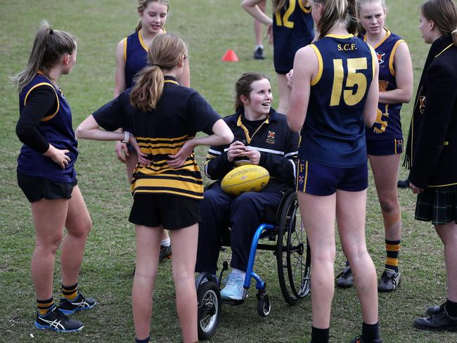 Katelin continues to defy the odds, now appointed an assistant coach for the girls’ footy team at her school – Scotch College – for which she used to play before her car accident. Picture: SARAH REED