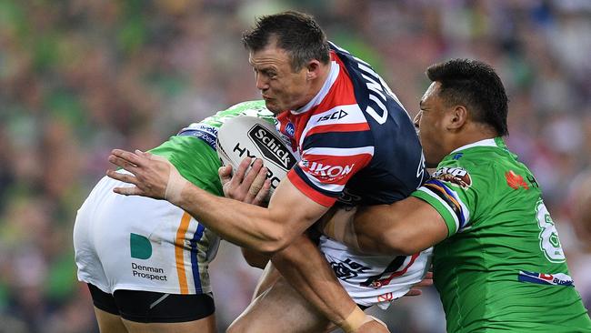 Brett Morris tries to get through the Canberra players. Picture: AAP Image/Dan Himbrechts