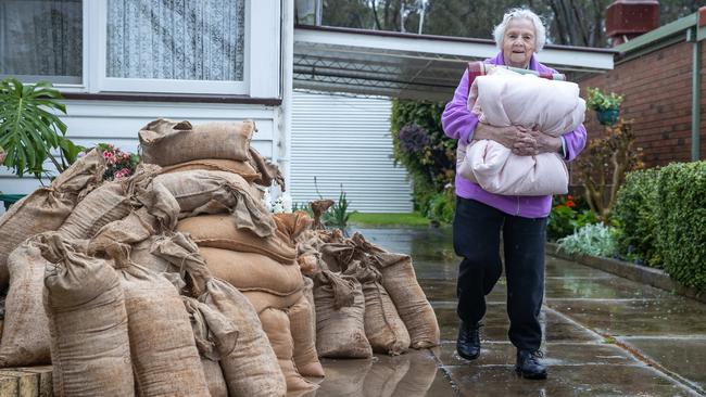 Naida Belot evacuates her granny flat in Rochester. Picture: Jason Edwards