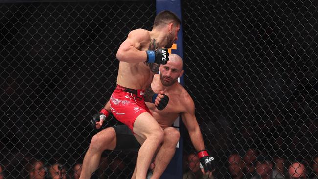 Ilia Topuria knocks out Alexander Volkanovski in their featherweight title fight during UFC 298 at Honda Center on February 17, 2024 in Anaheim, California. Sean M. Haffey/Getty Images/AFP (Photo by Sean M. Haffey / GETTY IMAGES NORTH AMERICA / Getty Images via AFP)