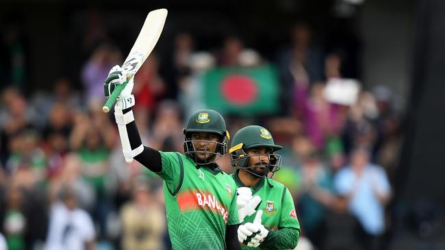 TAUNTON, ENGLAND — JUNE 17: Shakib Al Hasan of Bangladesh celebrates his century with Liton Das of Bangladesh during the Group Stage match of the ICC Cricket World Cup 2019 between West Indies and Bangladesh at The County Ground on June 17, 2019 in Taunton, England. (Photo by Alex Davidson/Getty Images)