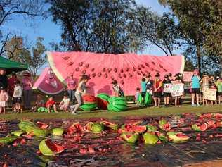 Chinchilla residents gathered in joy this morning to celebrate the unveiling of the 'Next Big Thing', the Big Melon. Picture: Amani Vassiliou