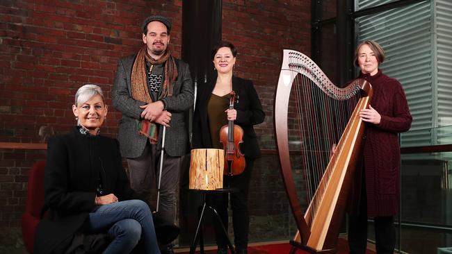 Arts Minister Elise Archer, Duncan Meerding artists with Julia Fredersdorff and Meriel Owen some of the members of Van Diemen's Band. Local artists have benefitted from state government support to help the recovery from impacts of COVID-19. Picture Nikki Davis-Jones