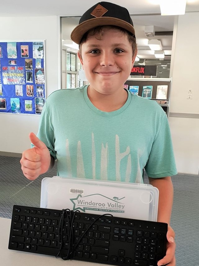 A windaroo Valley State High School student with one of the STEM kits.