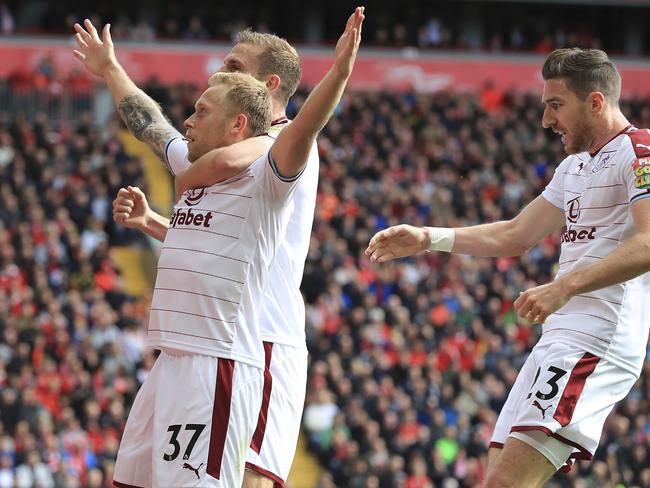 Burnley's Scott Arfield , left, celebrates.