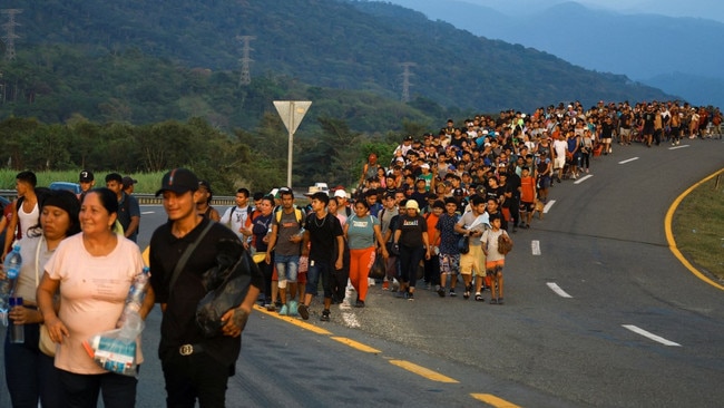 Migrants head for the US-Mexico border in January. Many are now heading home or elsewhere. Picture: Damian Sanchez/Reuters