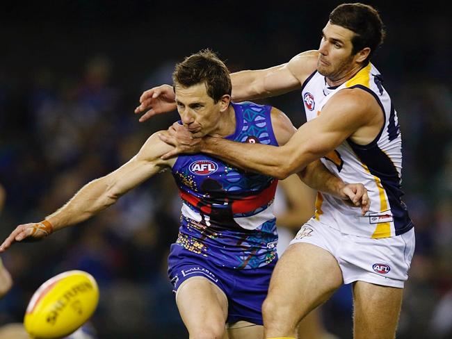 Dale Morris gets some close attention from Jack Darling. Picture: Michael Klein