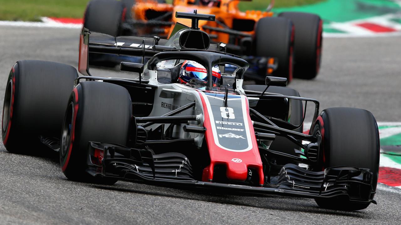 Romain Grosjean has been disqualified from sixth place at the Italian Grand Prix.