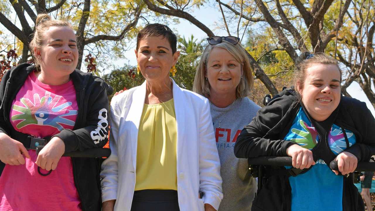 Sisters Gemma and Shaye Harrison with mother Sandra Harrison and their former support worker Mayor Tanya Milligan. Picture: Ebony Graveur