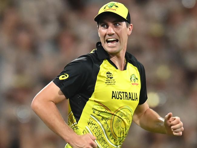 BRISBANE, AUSTRALIA - OCTOBER 31: Pat Cummins of Australia smiles after catching out Paul Stirling of Ireland  during the ICC Men's T20 World Cup match between Australia and Ireland at The Gabba on October 31, 2022 in Brisbane, Australia. (Photo by Albert Perez/Getty Images)