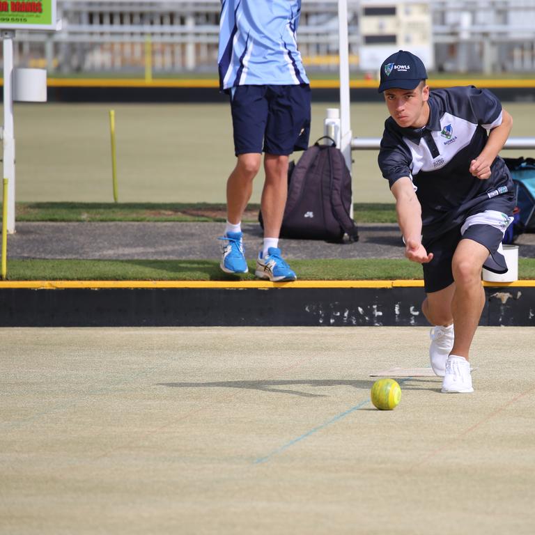 Action from the Australian Schools Super lawn bowls series played at Tweed Heads between Queensland, NSWCHS and Victoria. Jarryd Davies in action. Picture: BOWLS QLD