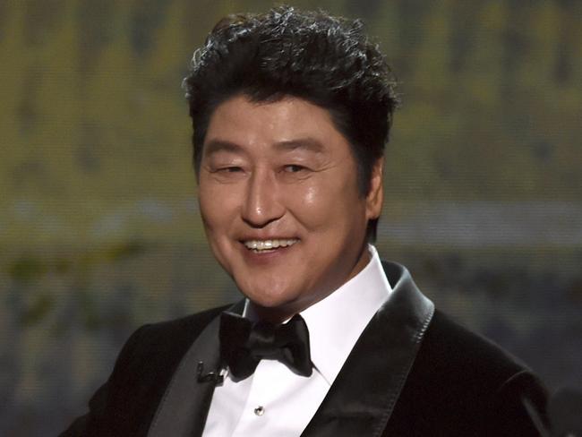 Kang-Ho Song appears on stage to introduce a clip from "Parasite at the 26th annual Screen Actors Guild Awards at the Shrine Auditorium & Expo Hall on Sunday, Jan. 19, 2020, in Los Angeles. (Photo/Chris Pizzello)