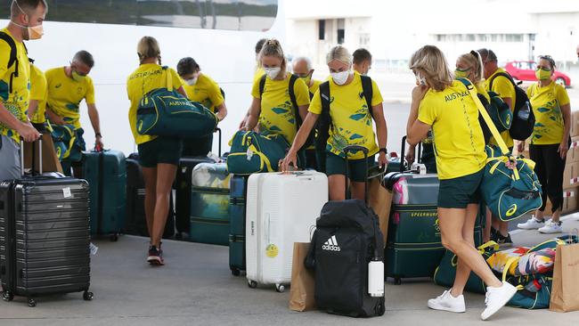 The first wave of athletes and officials from the Australian Olympic athletics team, who have been training at Barlow Park in Cairns for the past two weeks, departed for Tokyo on Sunday morning. Picture: Brendan Radke