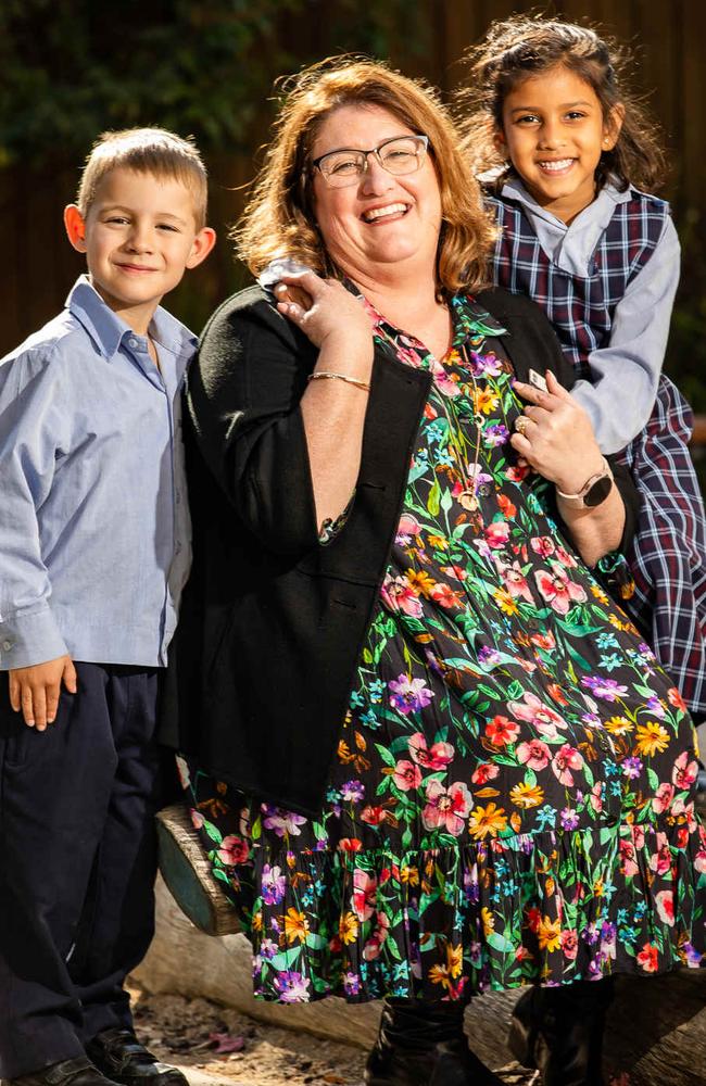 St Martin's Catholic Primary School teacher Helen Young who returned to the classroom following a stroke, and students Raphael Scalz and Ziva Patel. Picture: Tom Huntley