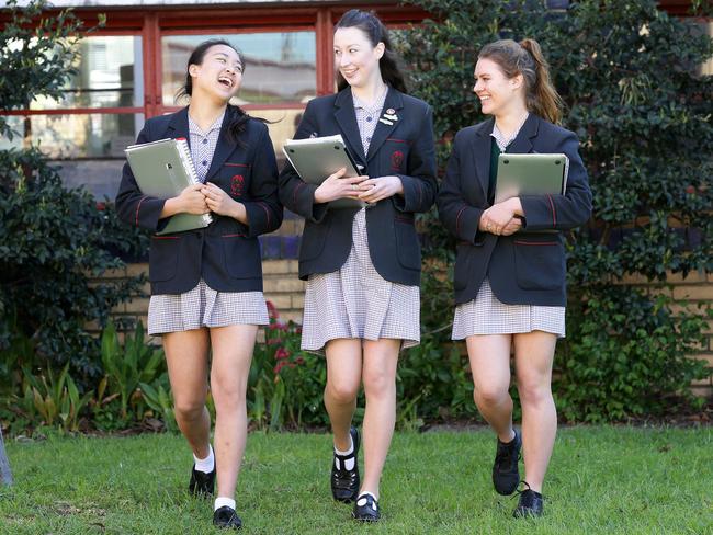 VCE Literature students at MacRobertson Girls Secondary School have discovered the benefits are studying in a group. (L-R) Year 12  MacRobertson Girls Secondary School students Emily Yang, Hannah Weston and Milla Ozimkovsky-Klein have a discussion in their Literature classPicture Norm Oorloff