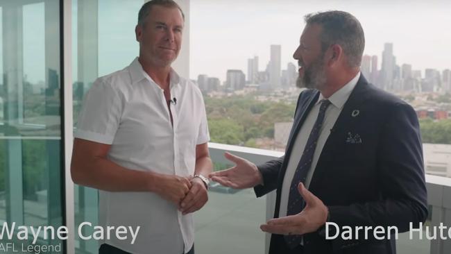 Wayne Carey with OBrien Real Estate director Darren Hutchins at 1301/188 Macaulay Rd, North Melbourne.