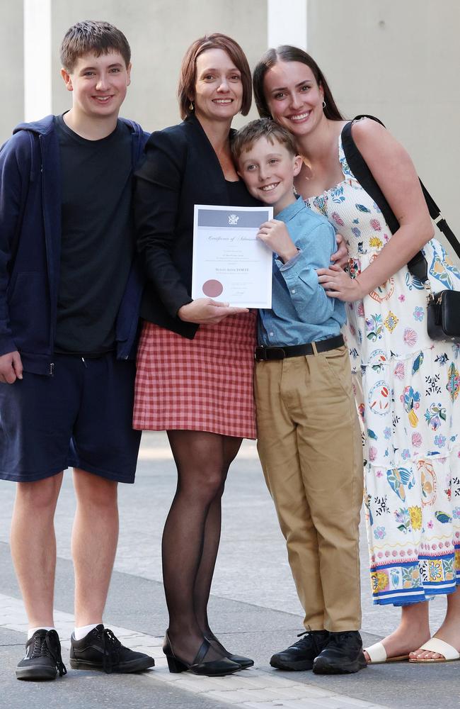 Susie Forte with her children Brodie, 16, Sam, 10, and Emma, 23, following her admission ceremony to be a practising lawyer, Supreme Court of Queensland, Brisbane. Picture: Liam Kidston.