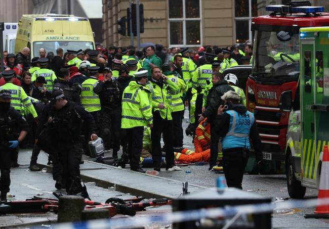 Four children were among those hurt, one seriously, after a vehicle swerved through the crowd minutes after the players' open-top bus passed by