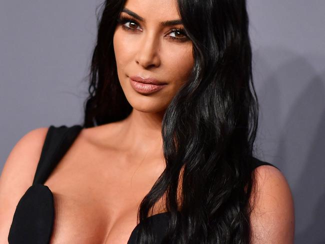 (FILES) In this file photo taken on February 6, 2019, US media personality Kim Kardashian West arrives to attend the amfAR Gala in New York. - Kim Kardashian found herself caught up in an unlikely international art smuggling row on May 4, 2021 involving an ancient Roman sculpture that was imported to California under her name. (Photo by ANGELA  WEISS / AFP)