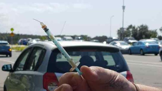 One of the two syringes found at the Spit yesterday. It appears to be bent spreading fears someone may have unknowingly stepped on it.