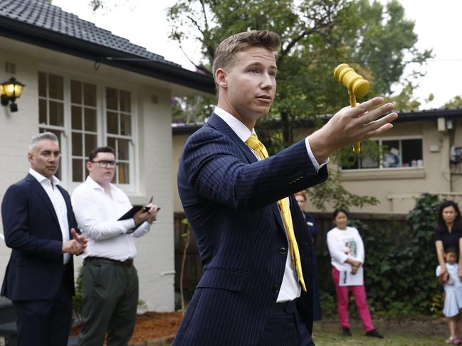 WEEKEND TELEGRAPH 15TH MARCH 2025Pictured is Ray White auctioneer Tom Van during the auction of 28 Vernon Street South Turramurra with the eventual selling price of 2.67 million dollars.Picture: Richard Dobson