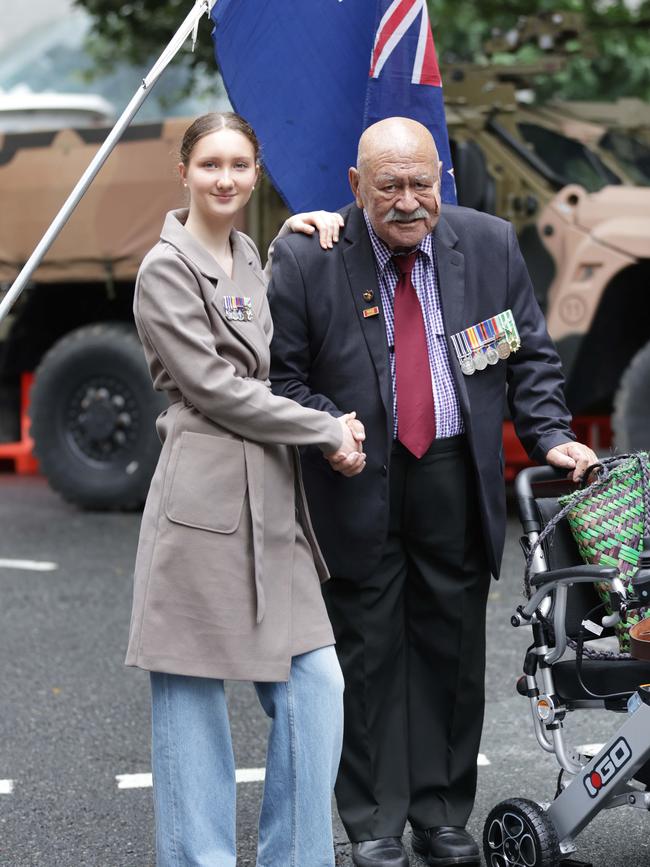 Emily Clapham with granddad Heta Heta, served for New Zealand in Vietnam 161 battery, lives at Riverhills, during the Anzac Day Parade. Photo: Steve Pohlner