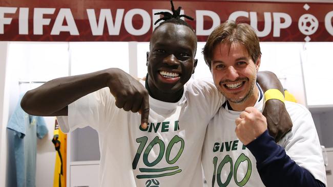 Awer Mabil and Australian coaching staff celebrate their win against Peru. Picture: Mohamed Farag/Getty Images