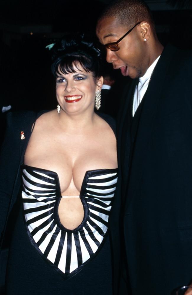 1995: Susie Elelman pictured with US actor Mark Curry. Picture: News Corp Australia