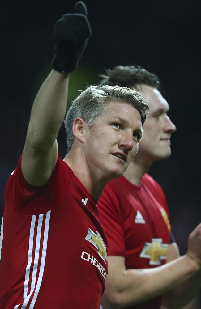 Manchester United's Bastian Schweinsteiger waves to the crowd.