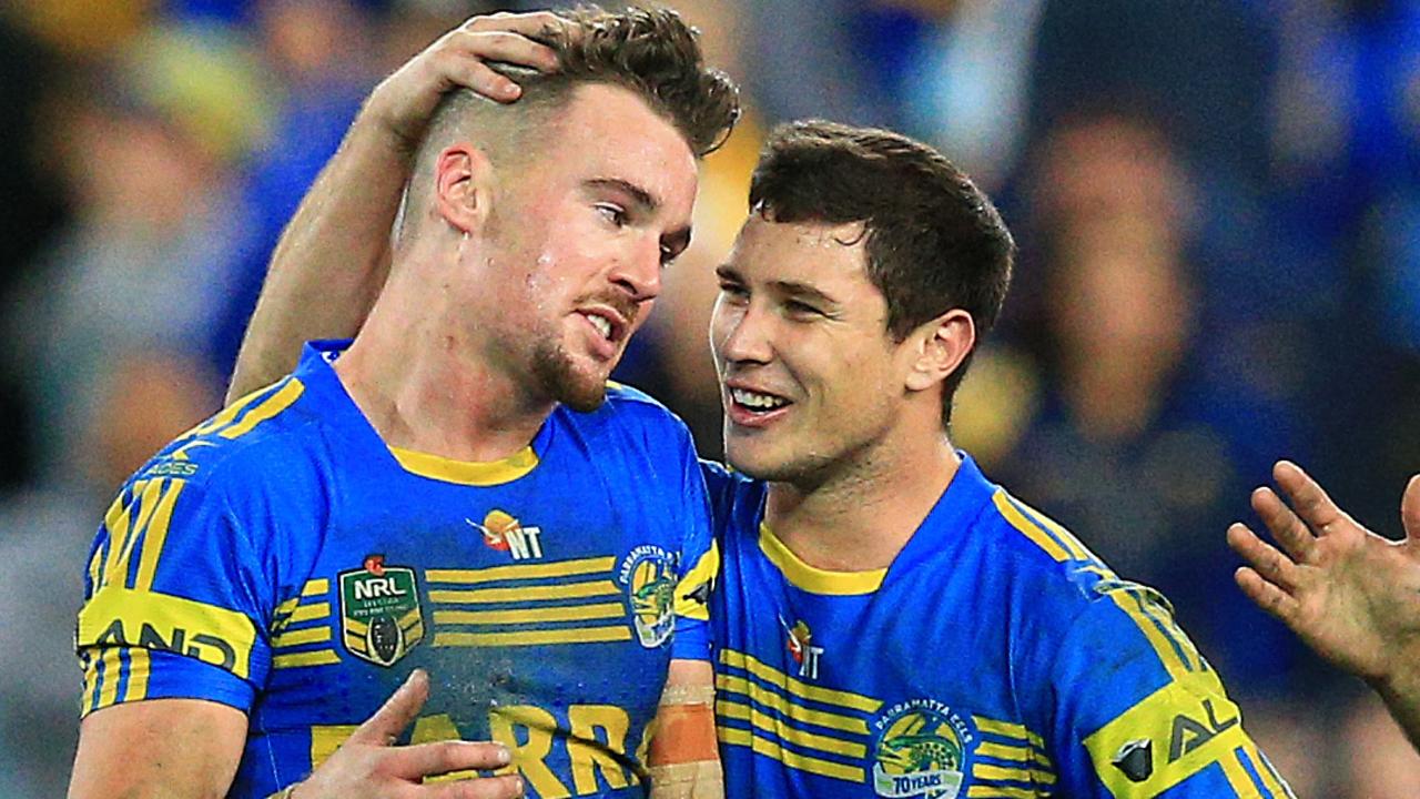 Clint Gutherson celebrates an Eels win with Mitchell Moses last year.
