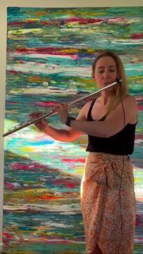 Music teacher Janelle Fletcher performs on flute