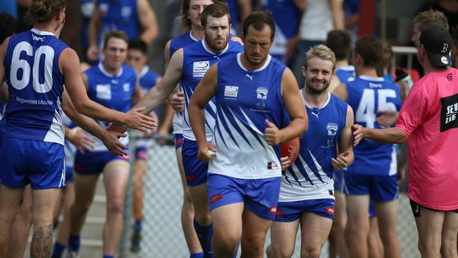 Club captain Chris Cerni leads his side out. Picture: Field of View Sports Photography